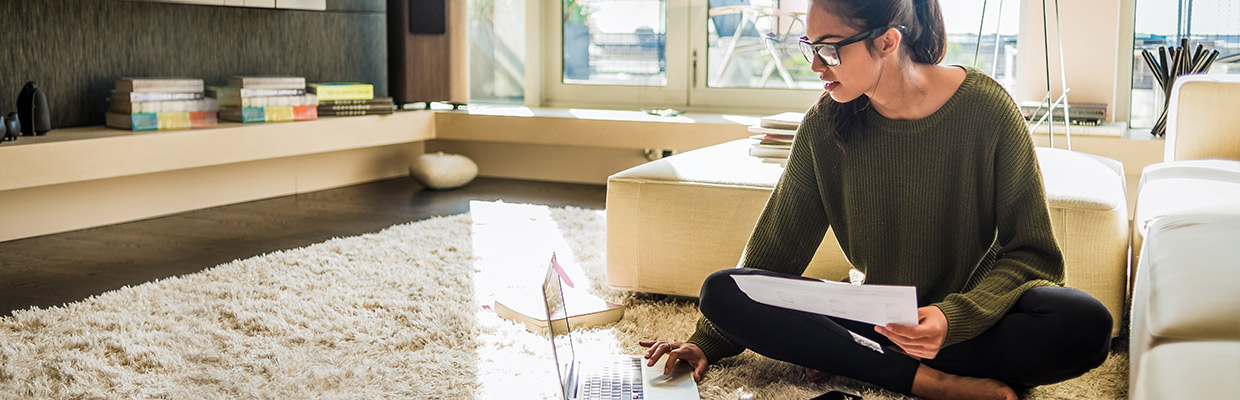 Woman checking her laptop